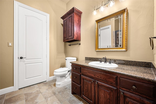 105 Zephyr Ct, Aurora, TX 76078 - bathroom with toilet, vanity, and baseboards