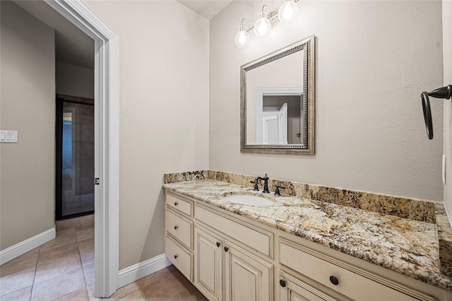 105 Zephyr Ct, Aurora, TX 76078 - bathroom featuring tile patterned floors, vanity, and baseboards