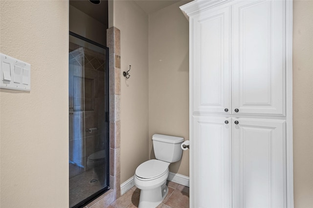 105 Zephyr Ct, Aurora, TX 76078 - full bathroom featuring baseboards, a stall shower, tile patterned floors, and toilet