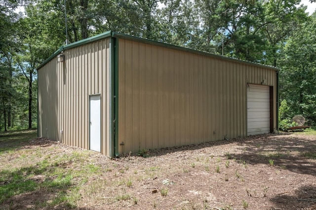 view of outbuilding with a garage