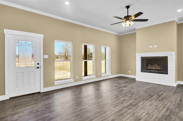 unfurnished living room featuring dark wood-type flooring, ceiling fan, and ornamental molding