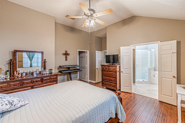 bedroom featuring dark hardwood / wood-style flooring, connected bathroom, high vaulted ceiling, and ceiling fan