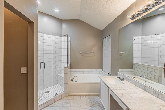 bathroom featuring plus walk in shower, lofted ceiling, vanity, and a textured ceiling