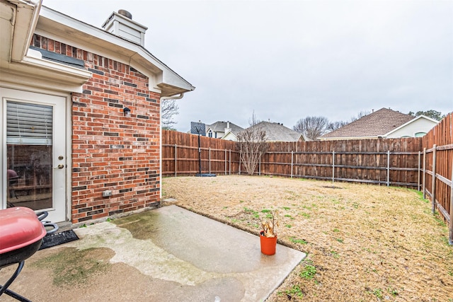 view of yard with a patio area