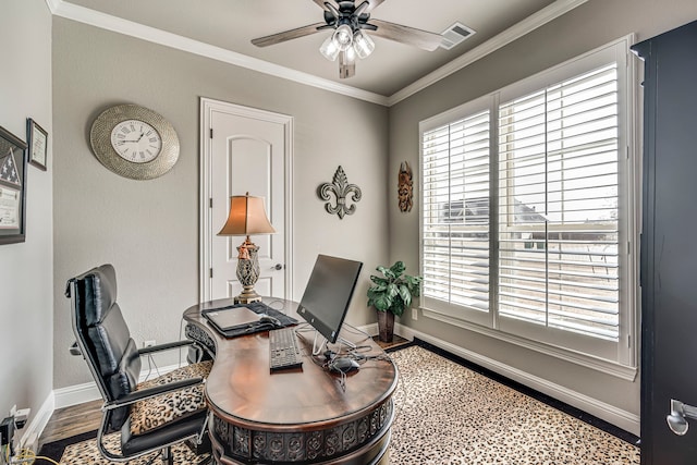 office area featuring ceiling fan, ornamental molding, wood-type flooring, and a wealth of natural light