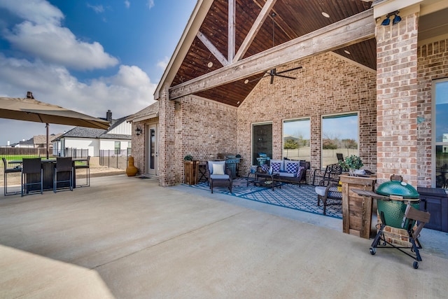 view of patio featuring ceiling fan and outdoor lounge area