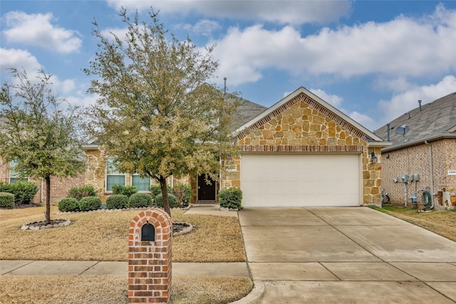 view of front of property featuring a garage