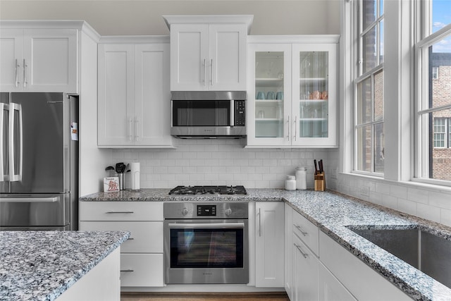 kitchen featuring white cabinetry and stainless steel appliances