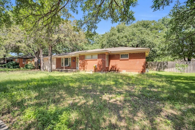 ranch-style house with a front yard