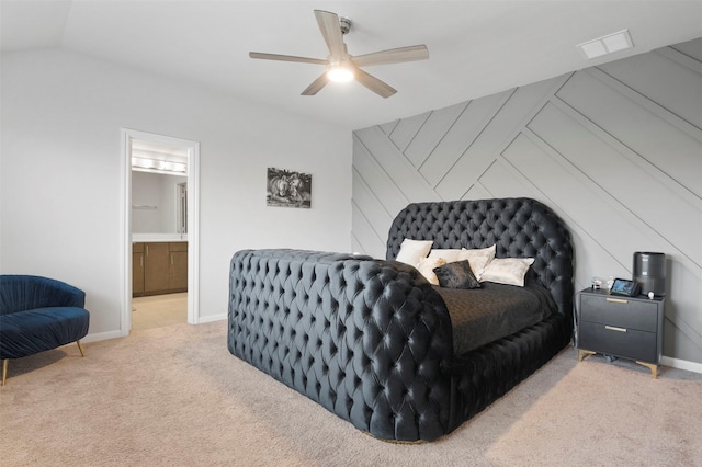 bedroom featuring ceiling fan, light colored carpet, and lofted ceiling