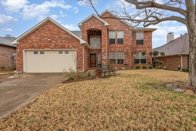 view of front property with a garage and a front lawn