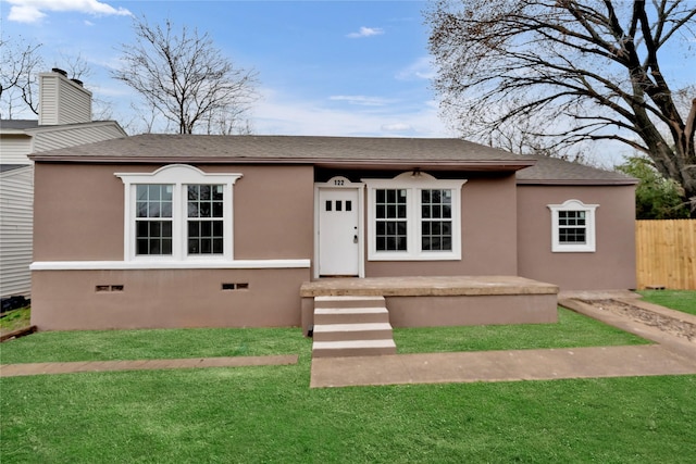 view of front facade featuring a front yard