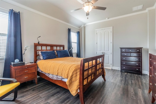 bedroom with ornamental molding, ceiling fan, and dark hardwood / wood-style flooring