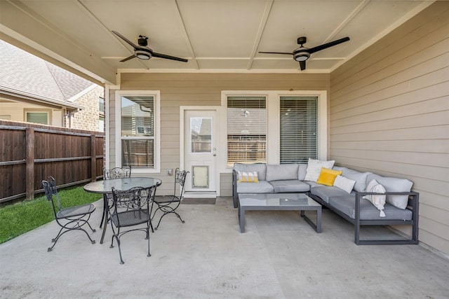 view of patio featuring outdoor lounge area and ceiling fan