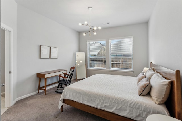 bedroom featuring light colored carpet and a notable chandelier