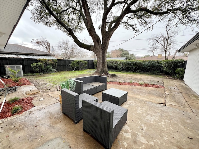 view of patio / terrace with central AC unit and outdoor lounge area