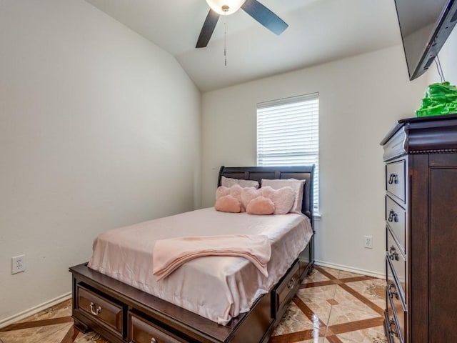 bedroom with lofted ceiling and ceiling fan