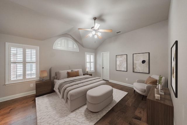 bedroom with hardwood / wood-style flooring, lofted ceiling, and ceiling fan