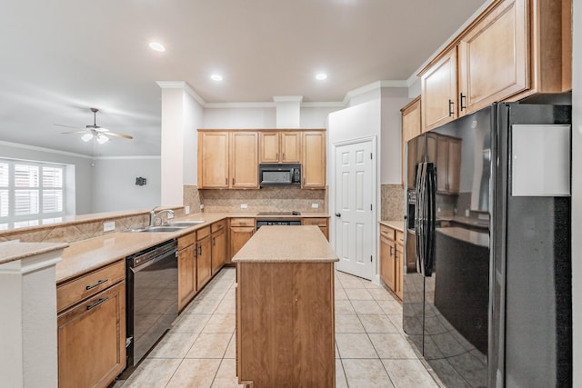 kitchen featuring black appliances, sink, a center island, light tile patterned floors, and kitchen peninsula