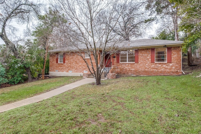 ranch-style home featuring a front yard