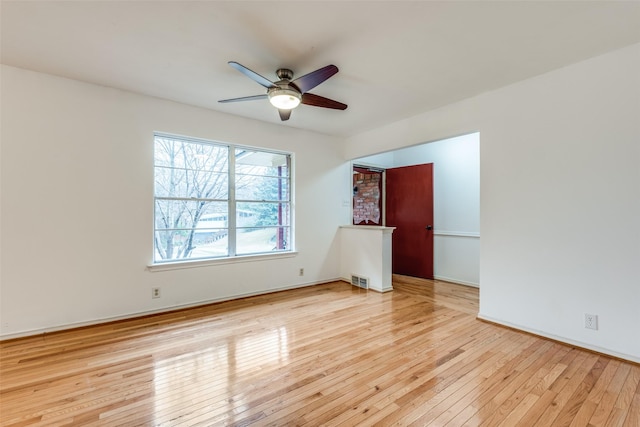 unfurnished bedroom with ceiling fan and light hardwood / wood-style flooring