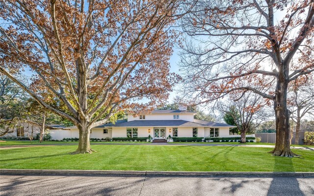 5212 Castlewood Rd, Dallas, TX 75229 - view of front of property with a front lawn and french doors