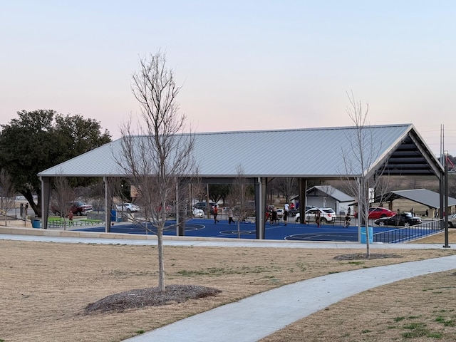 surrounding community featuring basketball court