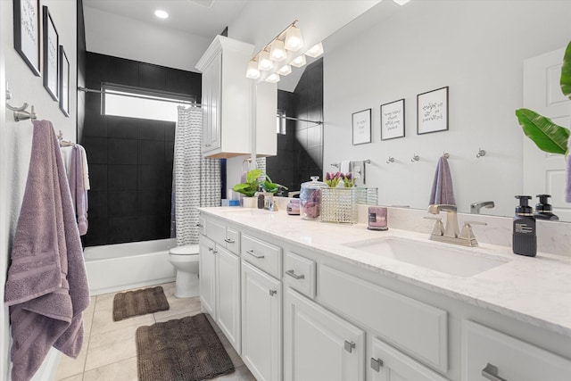 full bath featuring bathtub / shower combination, tile patterned flooring, toilet, a sink, and double vanity