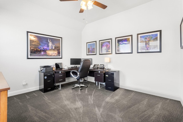 office with lofted ceiling, baseboards, dark carpet, and a ceiling fan