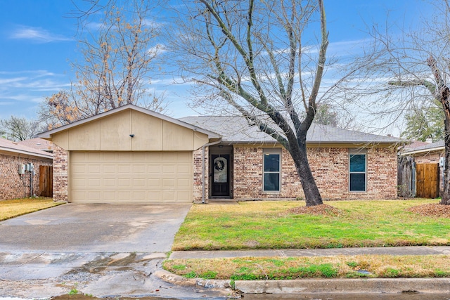 ranch-style home featuring a garage and a front lawn