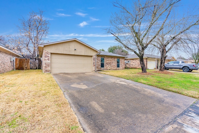 ranch-style house with a garage and a front yard