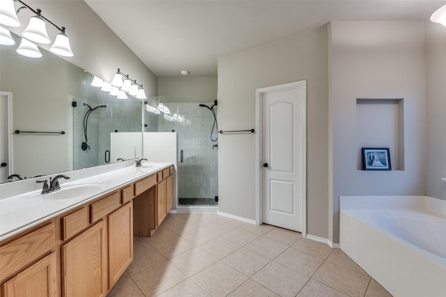 bathroom with vanity, independent shower and bath, and tile patterned flooring