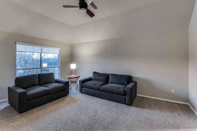 carpeted living room with lofted ceiling and ceiling fan