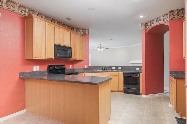 kitchen with ceiling fan, kitchen peninsula, sink, and black appliances