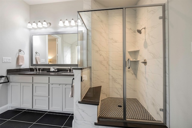2402 Topaz Dr, Rockwall, TX 75087 - bathroom featuring vanity, tile patterned flooring, and a shower with door