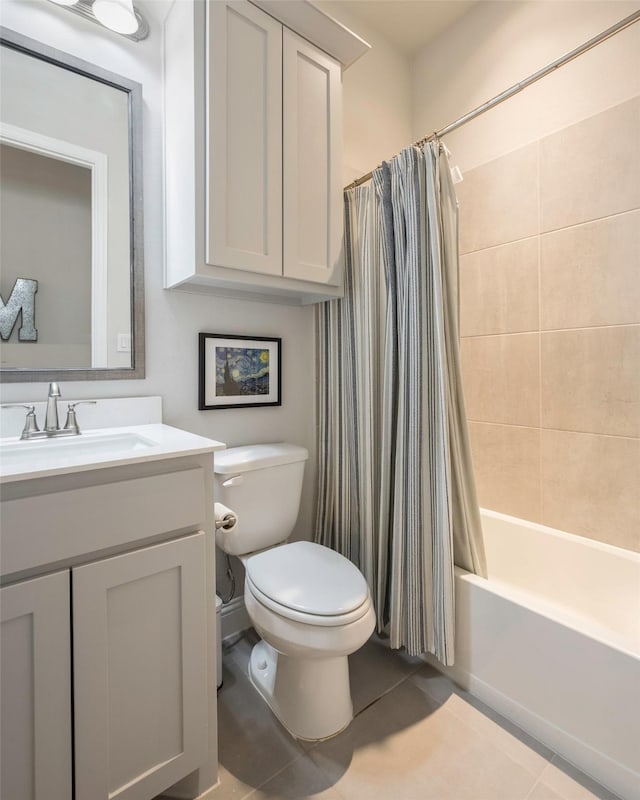 2402 Topaz Dr, Rockwall, TX 75087 - full bathroom featuring vanity, toilet, tile patterned flooring, and shower / bath combo