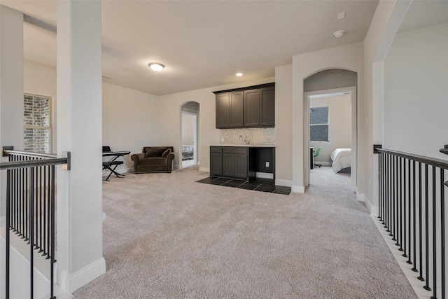 2402 Topaz Dr, Rockwall, TX 75087 - carpeted living room with sink