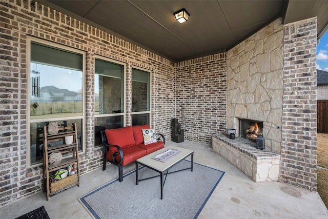 2402 Topaz Dr, Rockwall, TX 75087 - view of patio featuring an outdoor living space with a fireplace