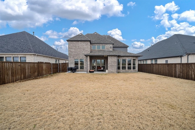 2402 Topaz Dr, Rockwall, TX 75087 - rear view of property with a patio area