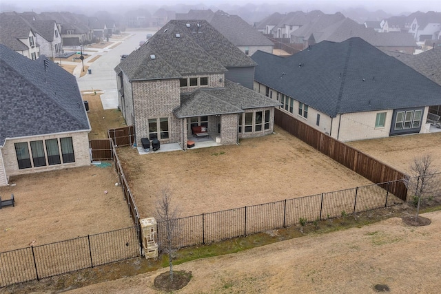 2402 Topaz Dr, Rockwall, TX 75087 - rear view of property featuring a patio area