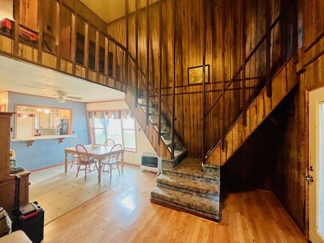 staircase featuring hardwood / wood-style floors