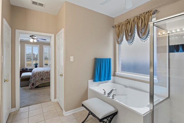 ensuite bathroom featuring a ceiling fan, visible vents, a stall shower, tile patterned flooring, and a bath