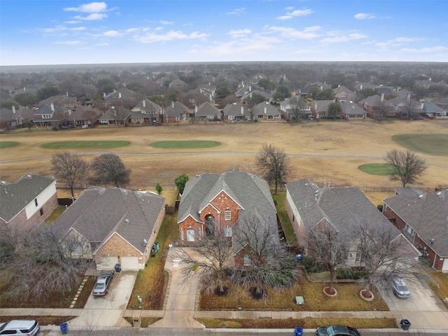 birds eye view of property featuring a residential view and view of golf course