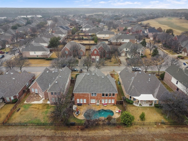 birds eye view of property with a residential view