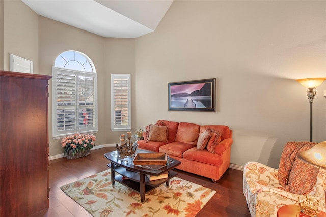 living room featuring wood finished floors and baseboards