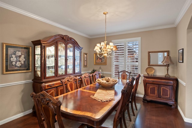 dining space with baseboards, a notable chandelier, dark wood finished floors, and crown molding