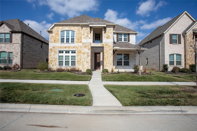 view of front of property with a front yard