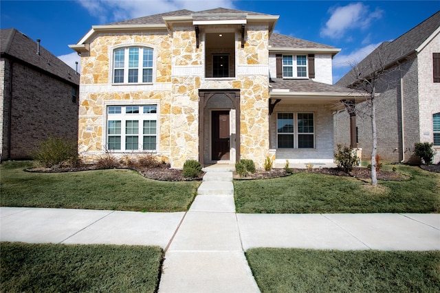 view of front of home with a front yard