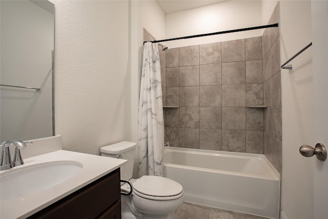 full bathroom with vanity, shower / tub combo, and toilet