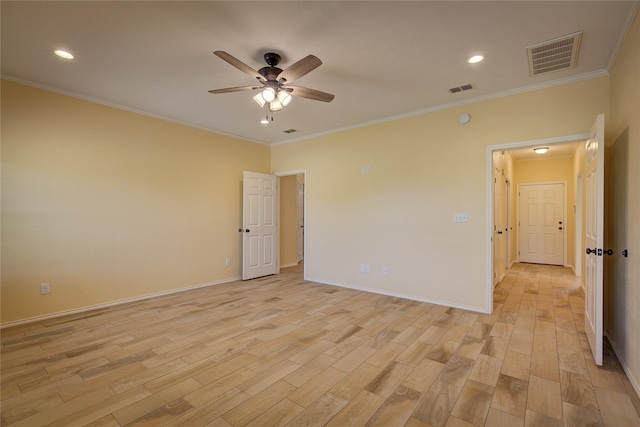 unfurnished room featuring ceiling fan, ornamental molding, and light wood-type flooring